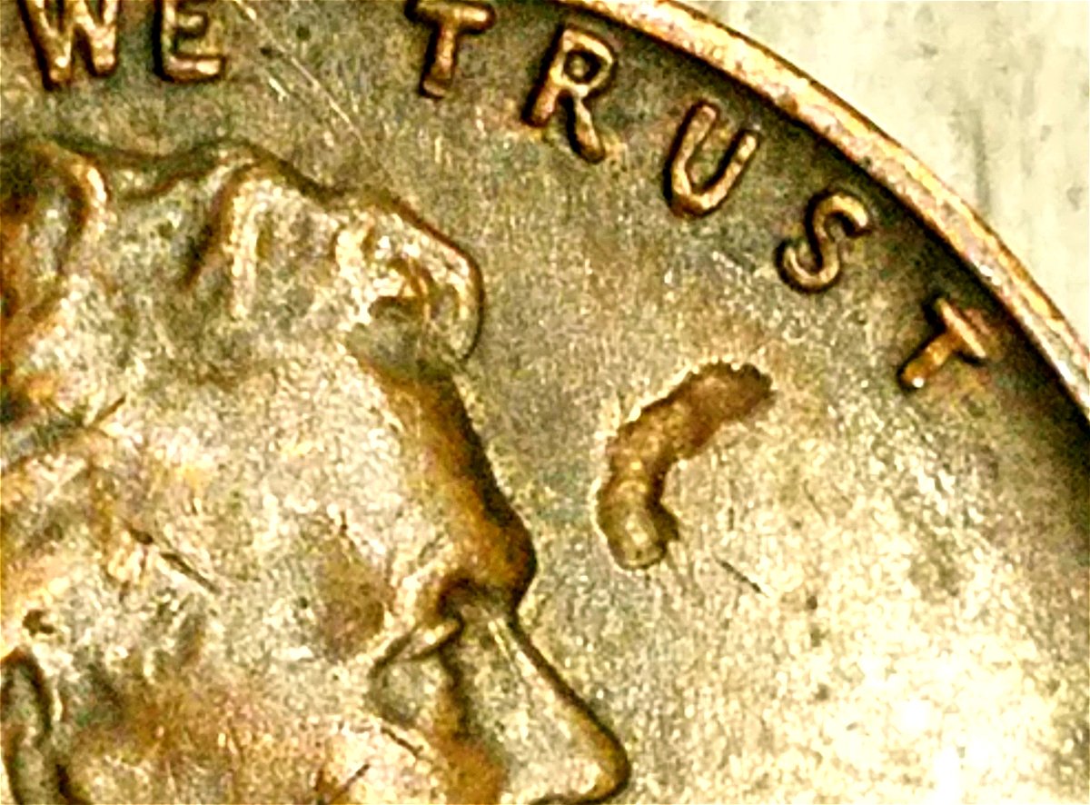 1961-P-Lincoln-Cent-Curved-Struck-Through-Or-Lamination-Near-Face?
